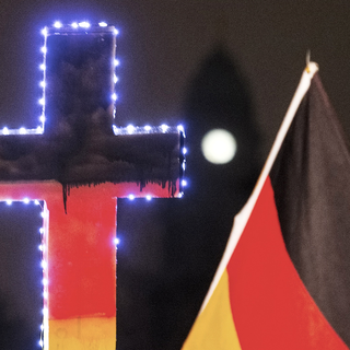 Manifestation de Pegida à Dresde, lundi 05.01.2014. [AP/Keystone - Jens Meyer]