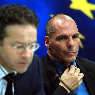 Le chef de l'Europgroupe Jeroen Dijsselbloem aux côtés du ministre grec des Finances nouvellement nommé Yanis Varoufakis. [EPA/Keystone - Simela Pantzartzi]