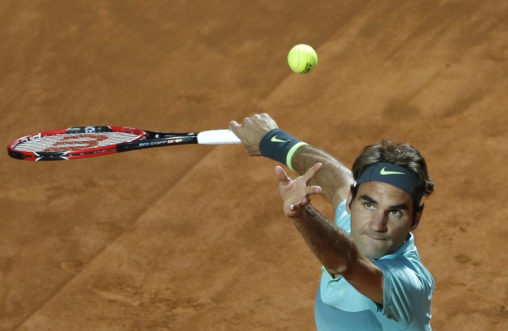 Malgré une petite alerte en début de match, c'est un Federer très concentré qui a imposé sa loi face à Wawrinka. [Keystone - Alessandra Tarantino]