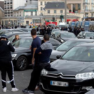 Une action de protestation de chauffeurs Uber à Paris le 9 octobre 2015. [AFP - Alain Jocard]