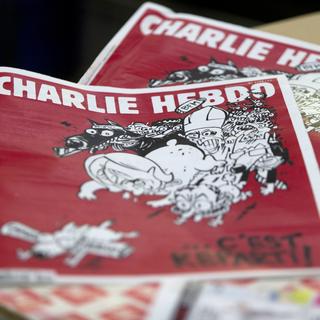 Charlie Hebdo reprend son rythme de parution normal depuis les attentats du 7 janvier. [AFP - Kenzo Tribouillard]