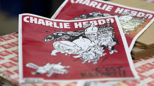 Charlie Hebdo reprend son rythme de parution normal depuis les attentats du 7 janvier. [AFP - Kenzo Tribouillard]