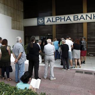 Les banques grecques resteront fermées lundi après l'échec des négociations. [EPA/ALEXANDROS VLACHOS]