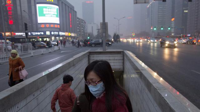 Même si ses émissions de CO2 ont été surestimées, la Chine reste le premier émetteur mondial de gaz à effet de serre. [AP Photo/Ng Han Guan]