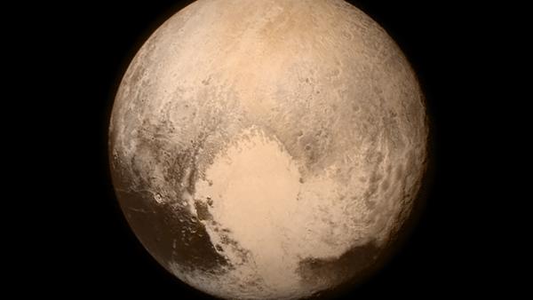 Une image de Pluton fournie par la sonde New Horizons aux chercheurs de la Nasa. [NASA AP]