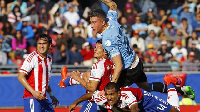 Ce match nul permet au Paraguay de prendre la tête du groupe B. [Javier Valdes]