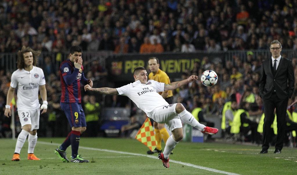 Marco Verratti et les Parisiens ont été impuissants au Camp Nou. [Keystone - Emilio Morenatti]