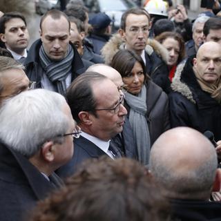 Le président François Hollande est arrivé à la rédaction de Charlie Hebdo. [AFP - Kenzo Tribouillard]