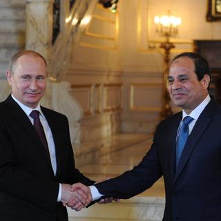 Vladimir Poutine et Abdel Fattah al-Sissi. [key - AP Photo/RIA Novosti, Mikhail Klementyev, Presidential Press Service]