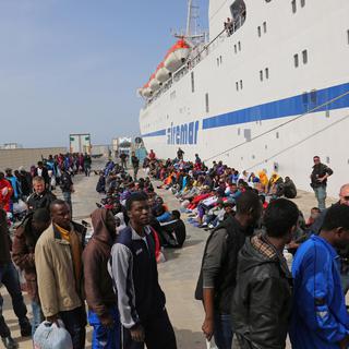 Un afflux sans précédent de migrants est enregistré en Méditerranée, ici vendredi à Lampedusa (Sicile). [AP]