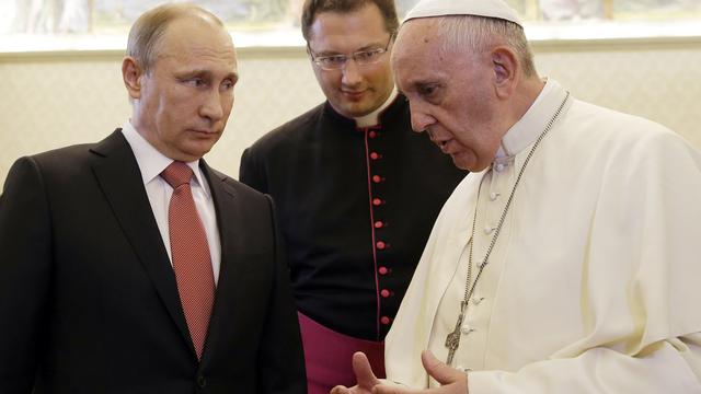 Le président russe Vladimir Poutine a rencontré le Pape François au Vatican. [AFP Photo - Gregorio Borgia]