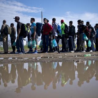Migrants à la frontière entre la Grèce et la Macédoine (photo prétexte). [Nikolay Doychinov]