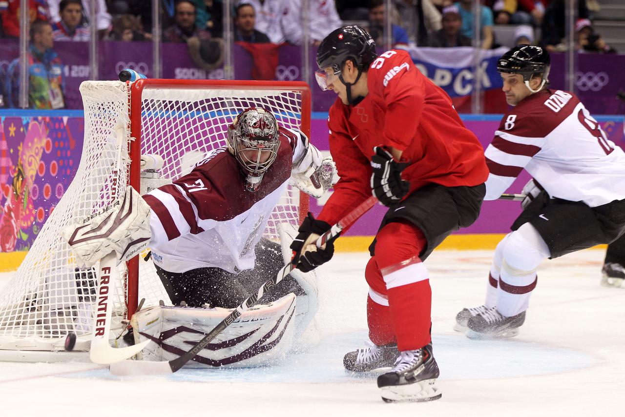 Brunner (en rouge) en action lors des JO de Sotchi en 2014. [EQ Images - Pascal Muller]