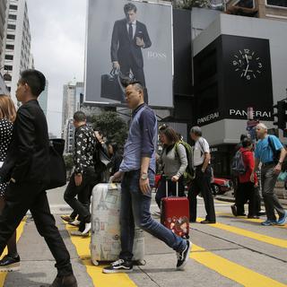 Hong Kong limite les venues des Chinois du continent. [key - AP Photo/Vincent Yu]