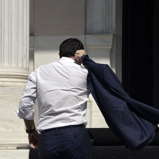 Le premier ministre Alexis Tsipras a annnoncé sa démission. [AFP - Louisa Gouliamaki]