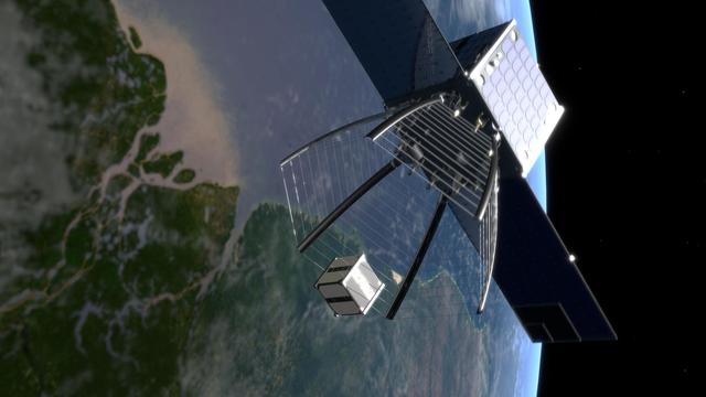 Illustration du satellite de nettoyage spatial de l'EPFL capturant SwissCube. [EPFL - Jamani Caillet]
