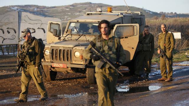 Des troupes israéliennes patrouillent dans un secteur occupé du Golan. [AFP - Jalaa Marey]