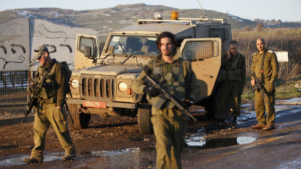 Des troupes israéliennes patrouillent dans un secteur occupé du Golan. [AFP - Jalaa Marey]