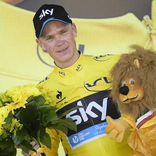 Chris Froome est désormais paré de jaune. [Belga Photo/AFP - Yorick Jansens]