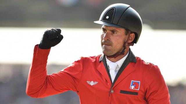 Le cavalier suisse Romain Duguet. [EPA/AFP - Friso Gentsch]