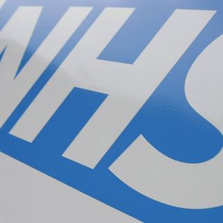 Logo du National Health Service (NHS). [AP / Keystone - Alastair Grant]