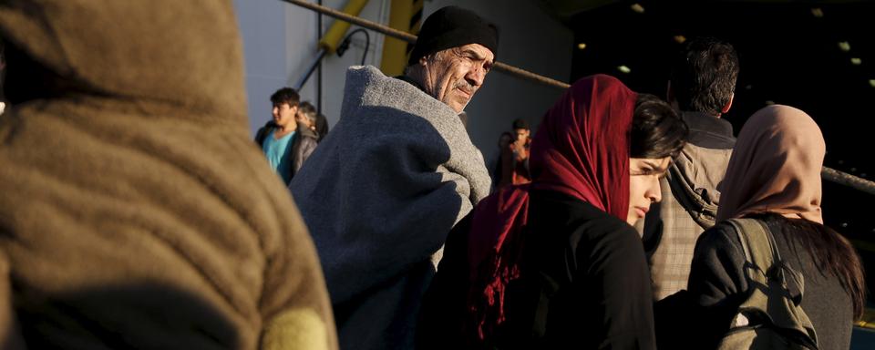 Des réfugiés arrivant au port de Piraeus, près d'Athènes (image prétexte). [Reuters - Alkis Konstantinidis]