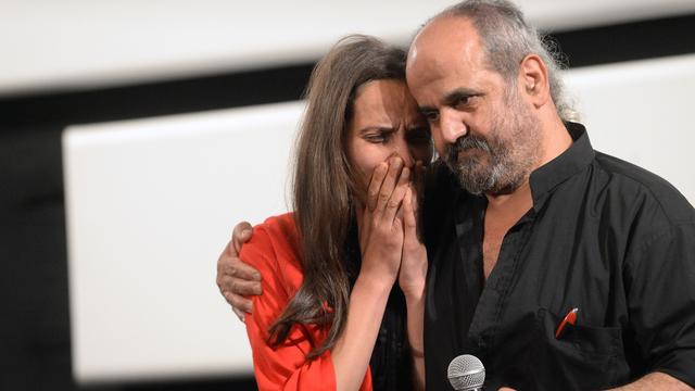 Le réalisateur syrien Ossama Mohammed et la réalisatrice kurde Wiam Simav Bedirxan au Festival de Cannes en 2014 pour leur film "Eau argentée". [AFP - Ammar Abd Rabbo]