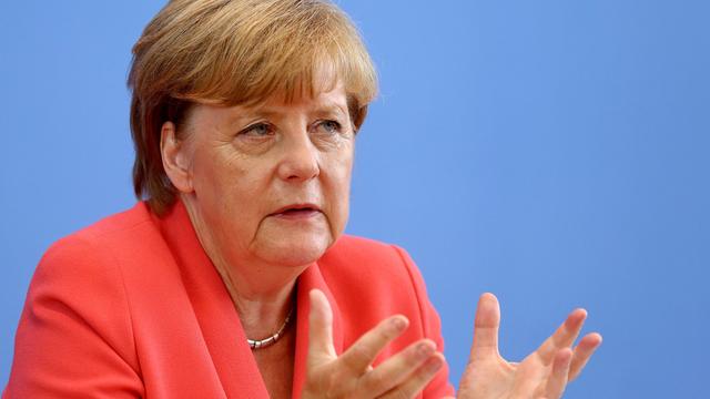 Angela Merkel devant la presse à Berlin, ce lundi 31.08.2015. [Anadolu Agency/AFP - Mehmet Kaman]