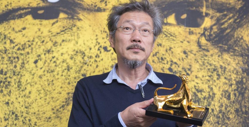 Le réalisateur sud-coréen Hong Sangsoo a reçu le Léopard d'or du 68e festival de Locarno. [Keystone - Urs Flueeler]
