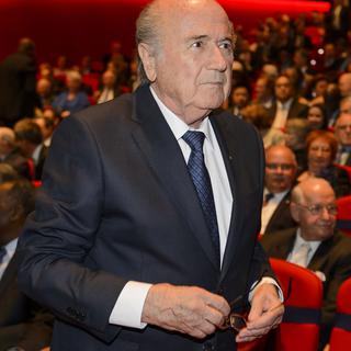 Sepp Blatter à son arrivée au congrès de la FIFA. [AFP - Fabrice Coffrini]