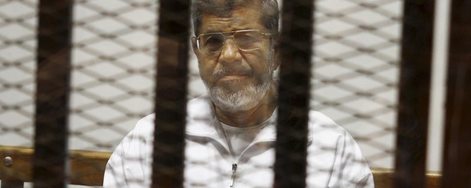 Mohamed Morsi, lors d'une audience au Caire, en mai 2014. [KEYSTONE - TAREK EL-GABBAS]