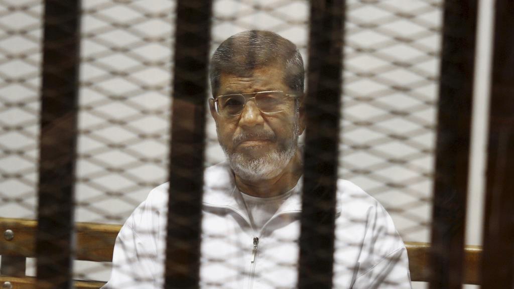 Mohamed Morsi, lors d'une audience au Caire, en mai 2014. [KEYSTONE - TAREK EL-GABBAS]
