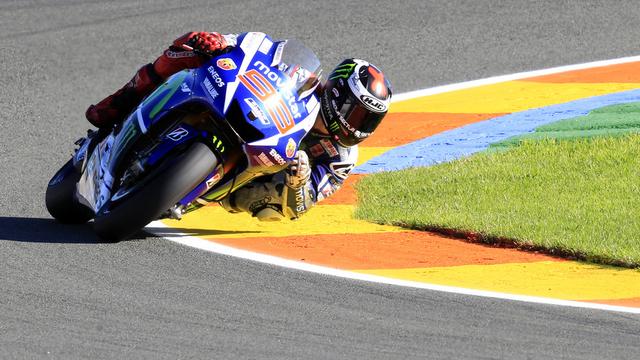 Lorenzo compte 7 points de retard sur Rossi avant l'ultime course de la saison. [Keystone - Eduardo Manzana]