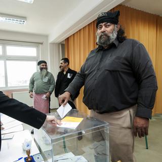 Les grecs se rendent aux urnes ce dimanche 25 janvier pour des élections "historiques". [Keystone - Bastian Parschau - AP Photo]