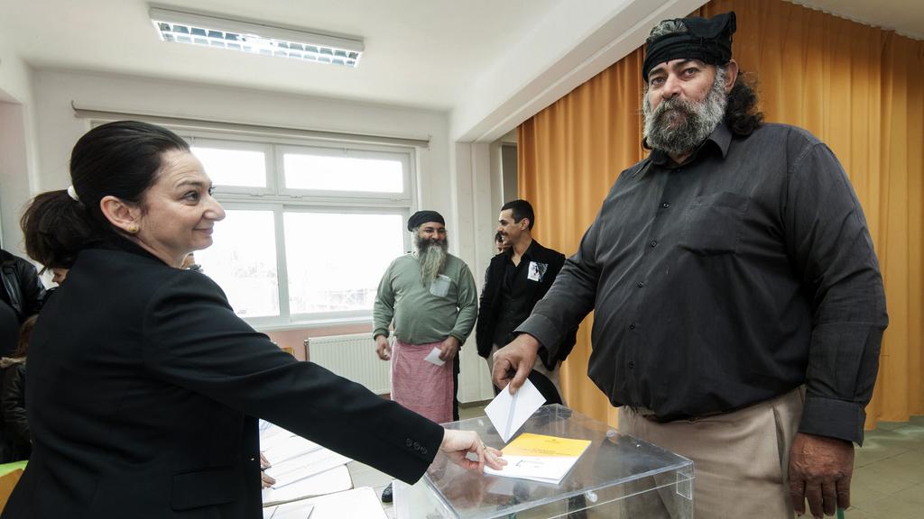 Les grecs se rendent aux urnes ce dimanche 25 janvier pour des élections "historiques". [Keystone - Bastian Parschau - AP Photo]