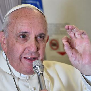 Le pape François a tenu une conférence de presse dans l'avion qui le ramenait à Rome après un voyage aux Philippines. [AP Photo/Giuseppe Cacace]