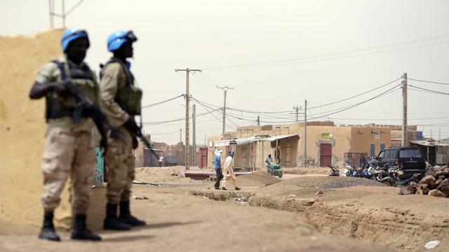 Soldats de la Minusma dans les rues de Kidal. [AFP - Kenzo Tribouillard]