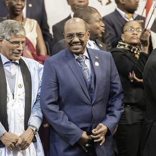 Omar el-Béchir (au centre) était à Johannesbourg pour un sommet de l'Union africaine. [AFP - Gianluigi Guercia]