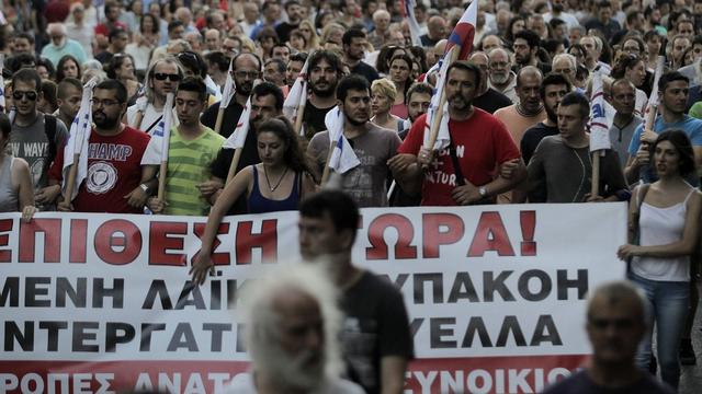 Manifestation contre l'austérité à Athènes. [Keystone - Orestis Panagiotou]