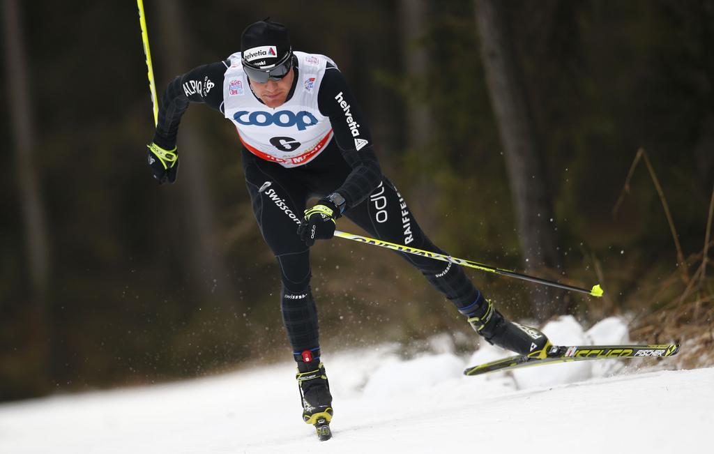 Victime d'une chute, Dario Cologna a été l'auteur d'une belle remontée et termine 3e. [KEYSTONE - Alessandro Trovati]