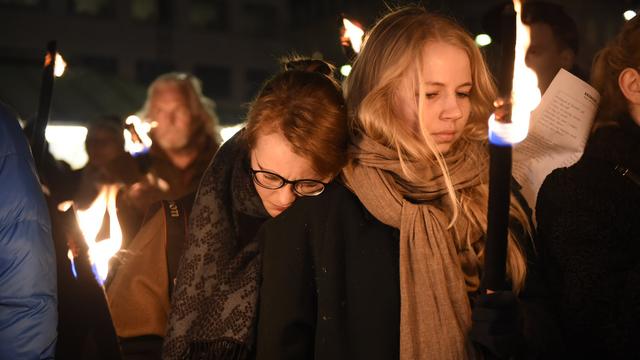 La ville danoise d’Aarhus a rendu hommage aux victimes des attentats de Copenhague. [Keystone - Joachim Ladefoged - AP Photo]