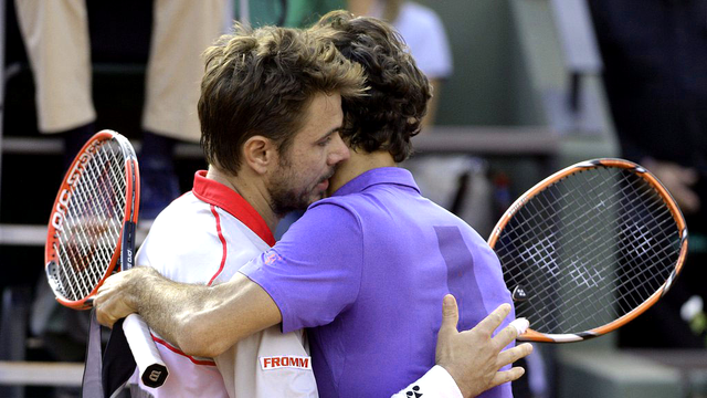 Wawrinka et Federer s'étaient affrontés ce pritnemps à Roland Garros. [EPA/Keystone - Caroline Blumberg]