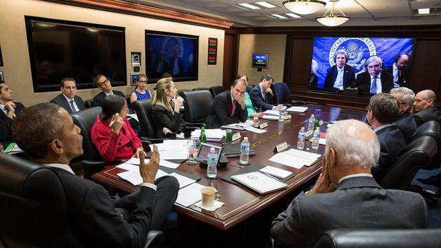 Barack Obama en discussion avec John Kerry depuis Ouchy. [EPA/Keystone - White House]