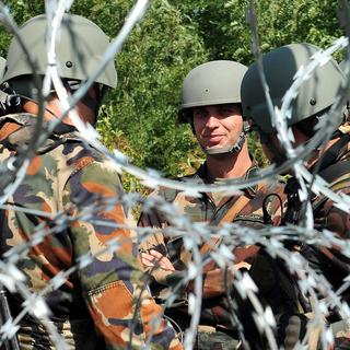 La Hongrie prolonge désormais sa clôture frontalière avec la Roumanie. [AFP - Elvis Barukcic]