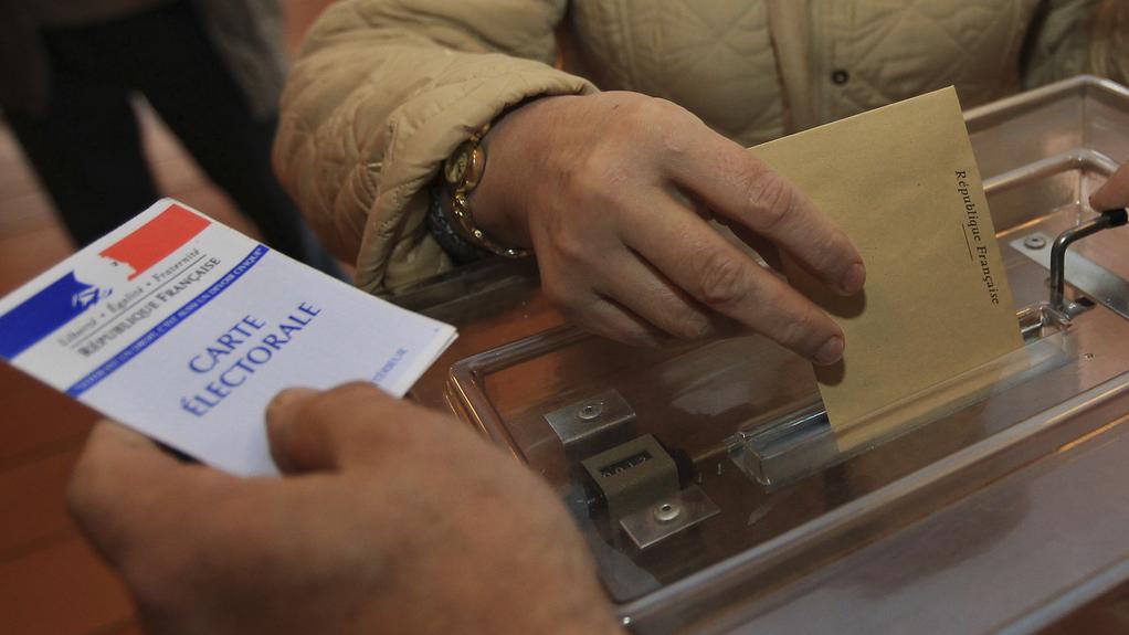 Ce dimanche, c'est le deuxième tour des élections départementales en France. [Keystone - Bob Edme - AP Photo]