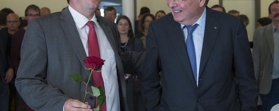 Christian Levrat, conseiller aux Etats socialiste fribourgeois et président du PSS et Jean-François Rime, conseiller national UDC fribourgeois et président de l’USAM. [Keystone - Lukas Lehmann]