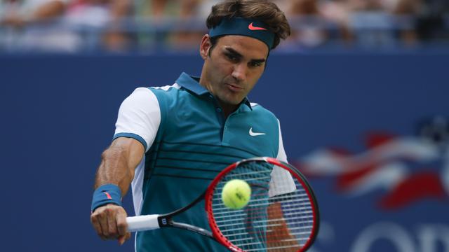 Federer (34 ans) n'a pas traîné sur le court. [Kena Betancur]