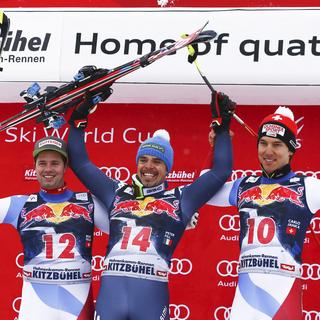 Beat Feuz, Peter Fill et Carlo Janka. [Keystone - Giovanni Auletta - AP Photo]