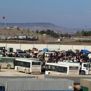 Des centaines de Syriens sont bloqués à la frontière turque. [IHH via AP/Keystone]