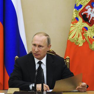 L’opposition russe a présenté un rapport qui s’en prend au parti de Vladimir Poutine. [AP/Keystone - Mikhail Klimentyev]
